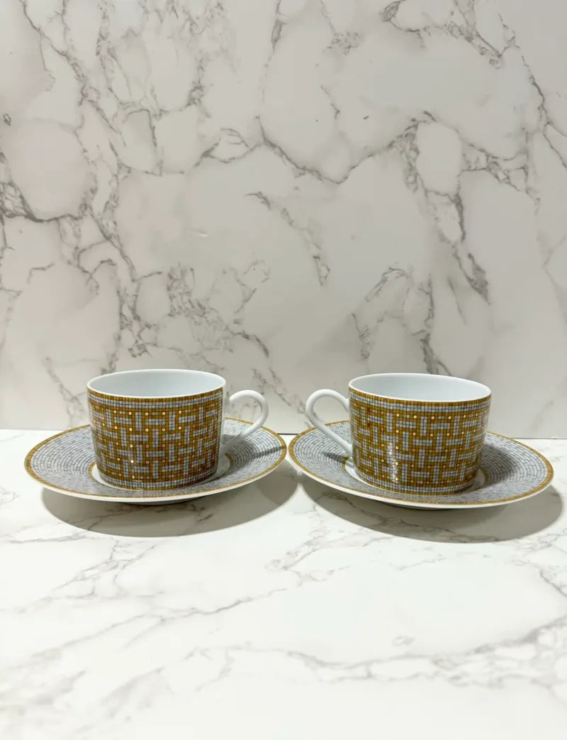 Hermes Mosaique au 24 gold tea cup and saucer