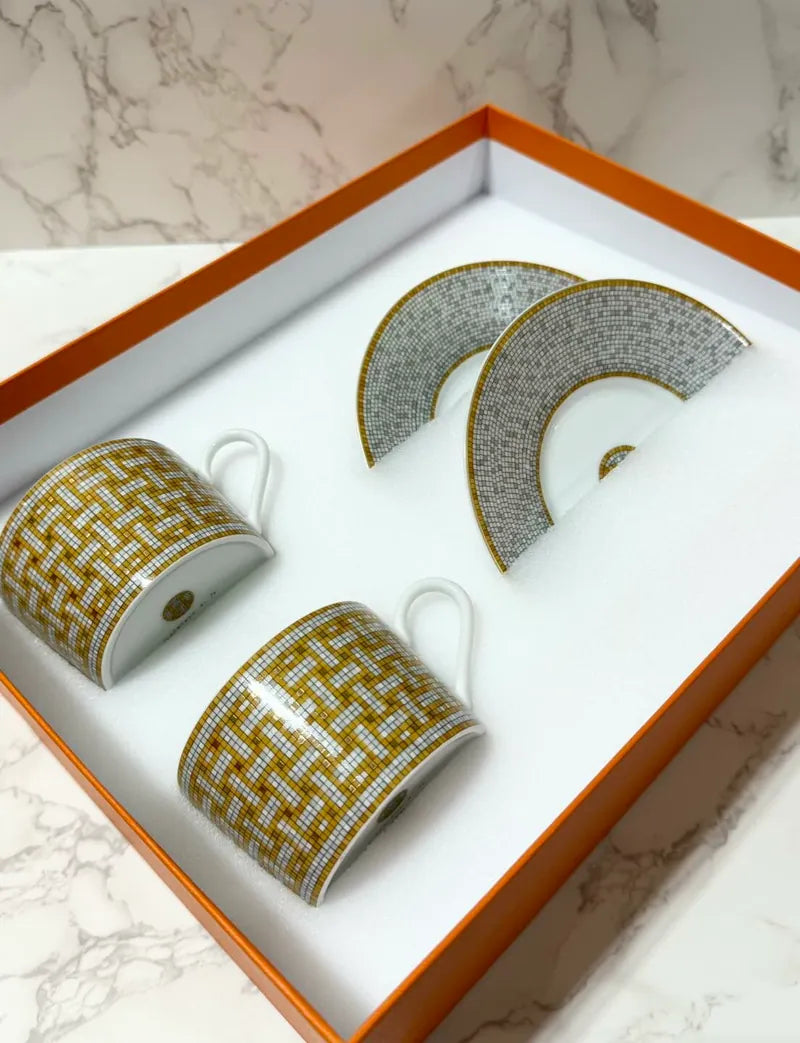 Hermes Mosaique au 24 gold tea cup and saucer